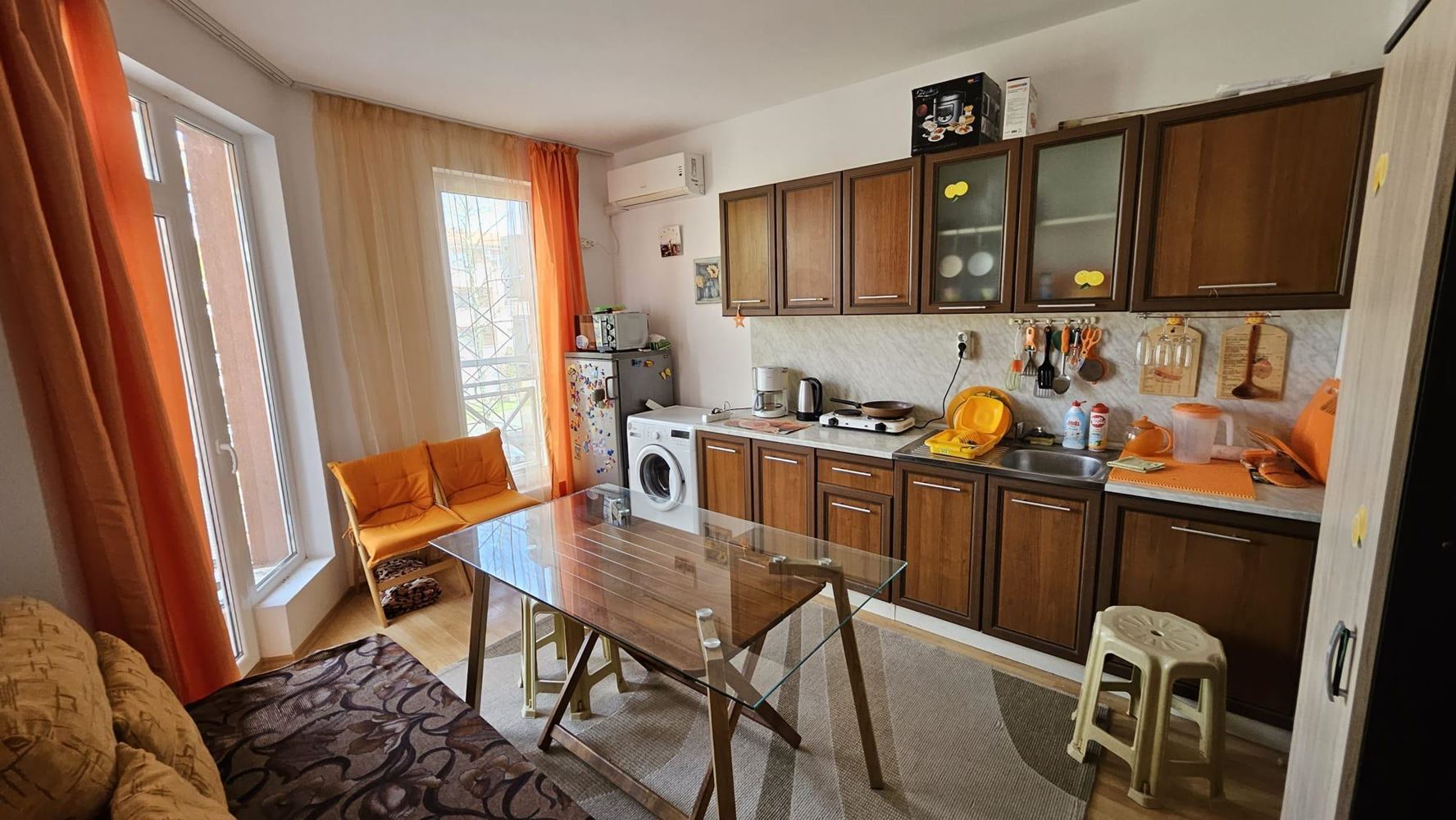 Модерен двустаен апартамент в затворен комплекс с басейни и водни атракции в района на Слънчев бряг